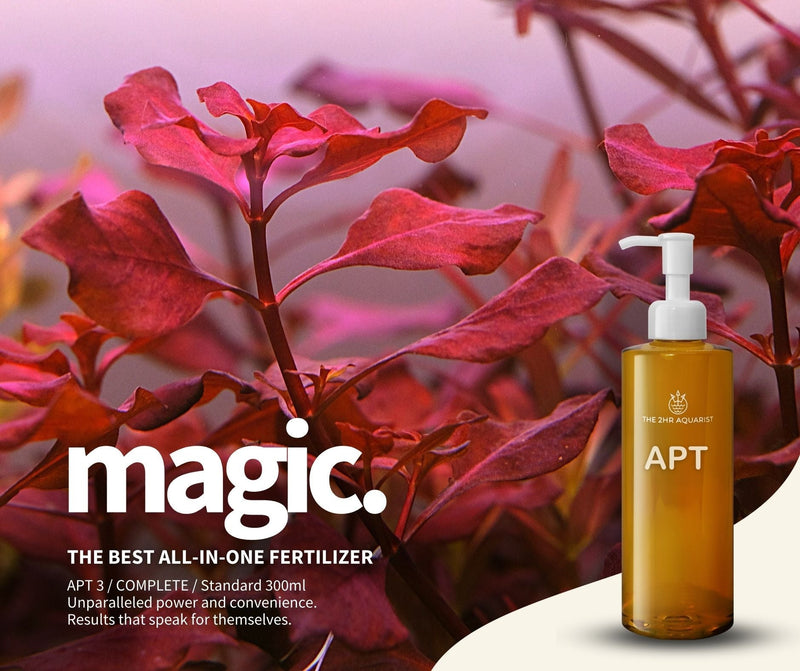 Bottle of 2HR Aquarist APT 3 Complete fertilizer for aquatic plants, featuring a clear label and green cap.