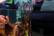 Stainless steel Lily pipes with skimmer for aquarium filtration by Aqua Worx Flux, designed for efficient water flow and cleaning.