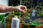 Aquario Neo Booster Plants Ferti water conditioner bottle for aquatic plants, used to improve water quality in aquariums.