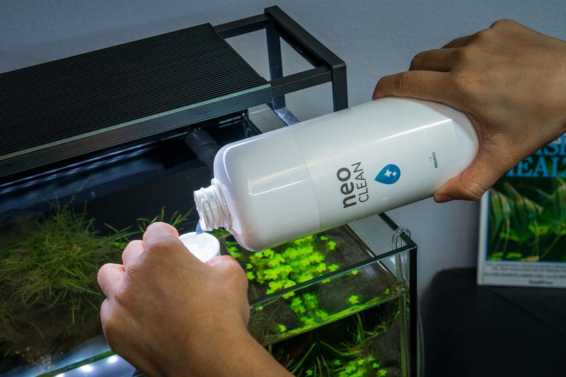 Aquario Neo Clean water conditioner bottle, transparent plastic container with label, used for aquarium water treatment.