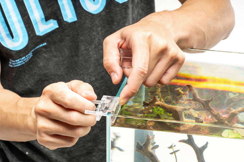 Aquario Neo Lily Pipe Holder accessory for aquariums, featuring a sleek design to securely hold lily pipes in aquatic setups.