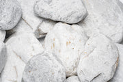UNSHARDSCAPE Ashen Stone, a natural gray stone with textured surface, ideal for decorative or craft projects.