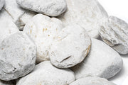 Unshardscape Ashen Stone, a gray textured stone with a rough surface, used for decorative or construction purposes.