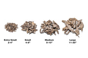 Assorted UNSHARDSCAPE driftwood accent pieces, natural wood decor for interior and outdoor design, varied shapes and sizes.