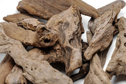 Assorted driftwood accent pieces from UNSHARDSCAPE, natural wood with unique textures and shapes for decorative use.