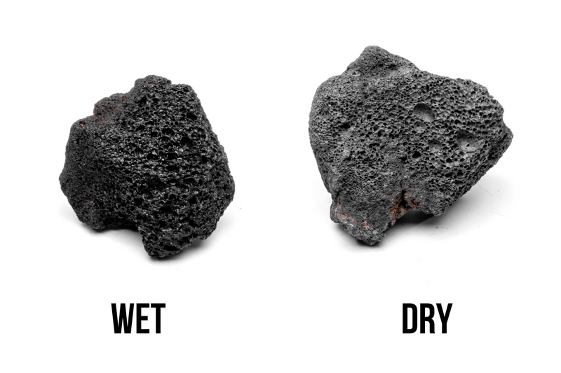 Black Lava Rock stone from UNSHARDSCAPE, showing textured, porous volcanic stone for landscaping or decorative use.