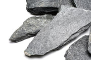 Black slate hardscape tile from UNSHARDSCAPE, showcasing a smooth, dark stone surface for outdoor landscaping projects.