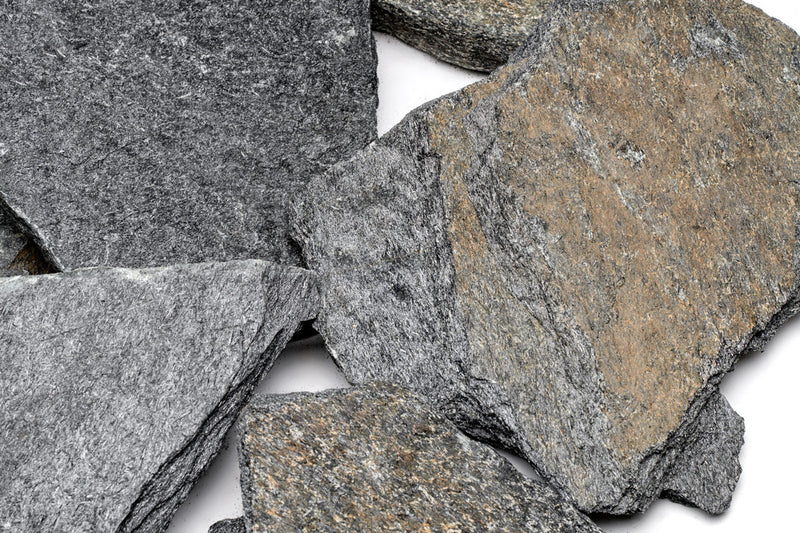 Black slate hardscape tile from UNSHARDSCAPE showing smooth, matte black surface ideal for outdoor landscaping and design.