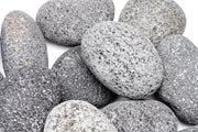Black Star Lava Rock stone by UNSHARDSCAPE, showing textured black volcanic rock with star-like mineral patterns.