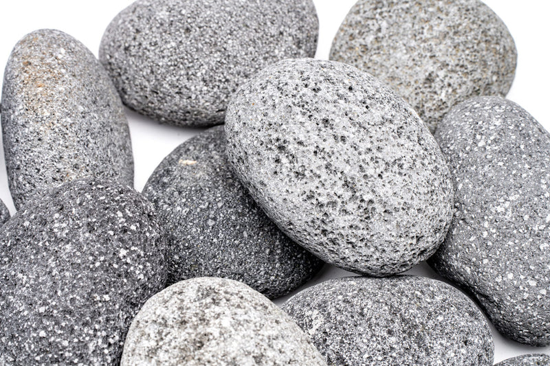 Black Star Lava Rock stone by UNSHARDSCAPE, showing textured black volcanic rock with star-like mineral patterns.