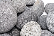 Black Star Lava Rock stone from UNSHARDSCAPE with textured black volcanic surface and natural porous appearance.