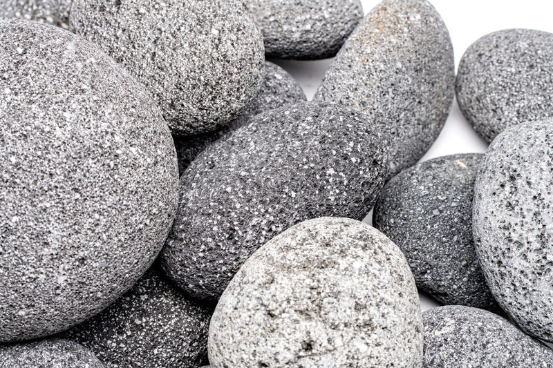 Black Star Lava Rock stone from UNSHARDSCAPE with textured black volcanic surface and natural porous appearance.