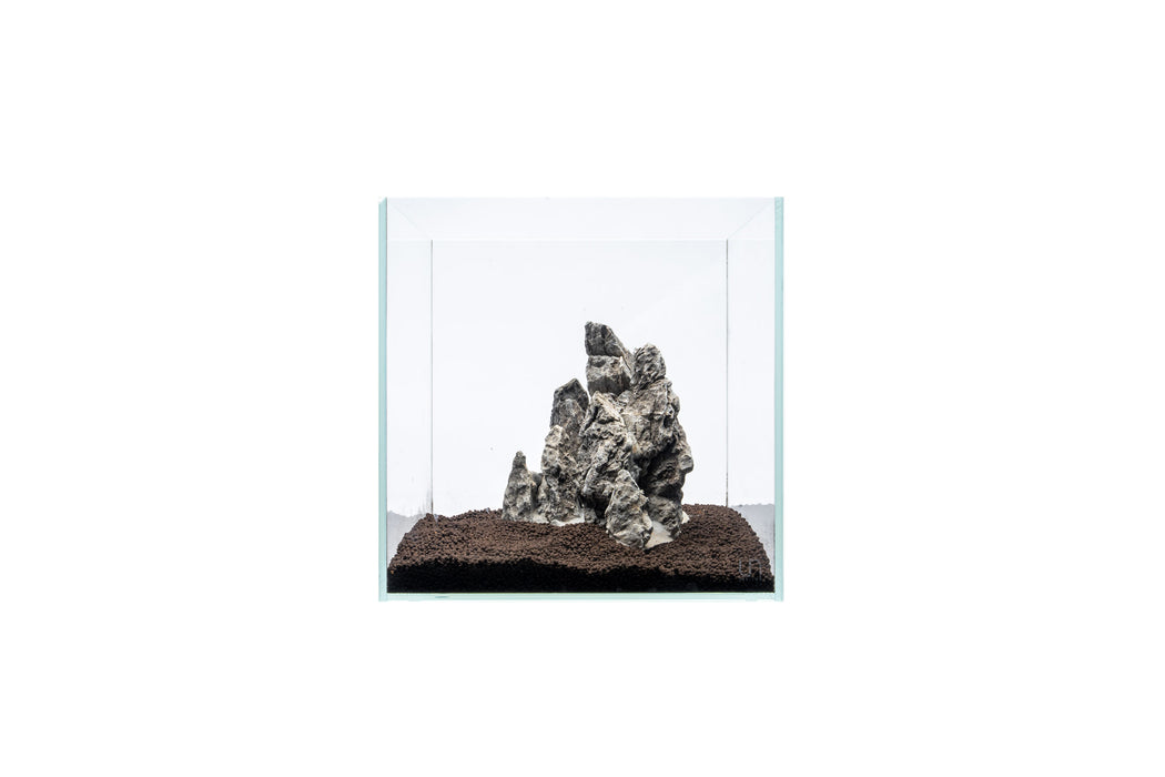 UNSHARDSCAPE Boutique Seiryu Stone showpiece with textured natural stone surface on a display stand