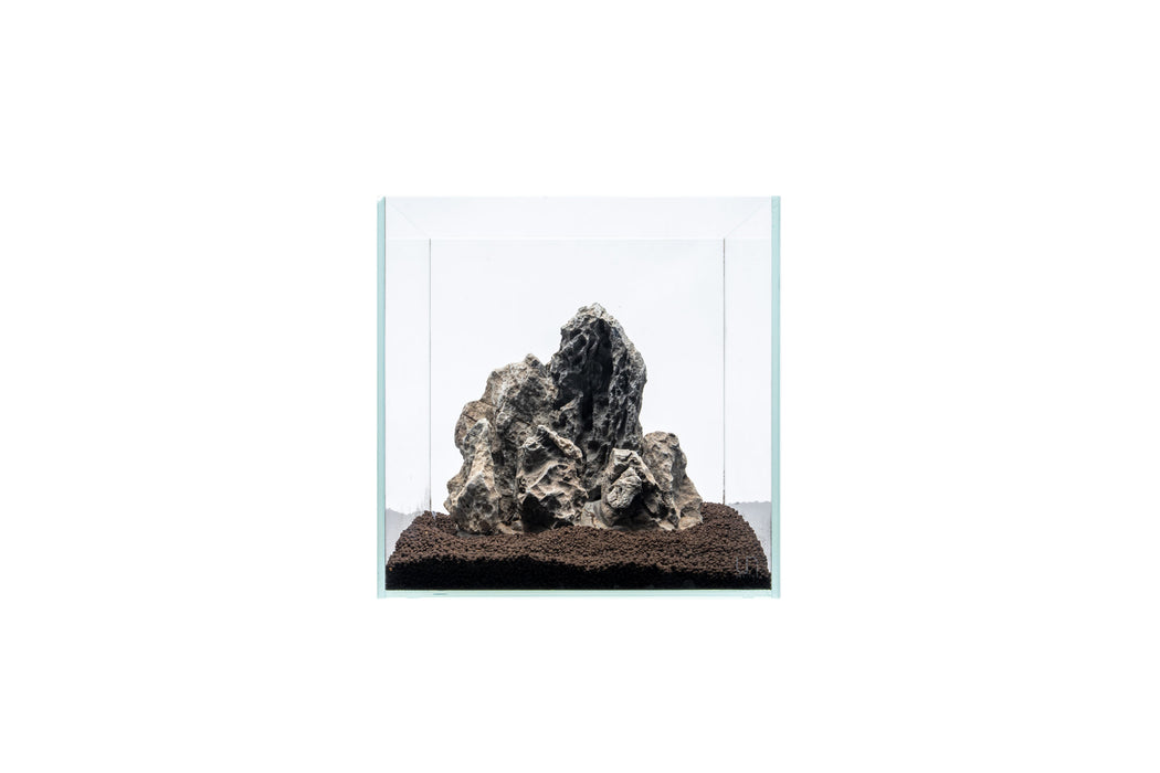 Elegant Seiryu stone showpiece by UNSHARDSCAPE, showcasing natural blue-gray stones with textured details.