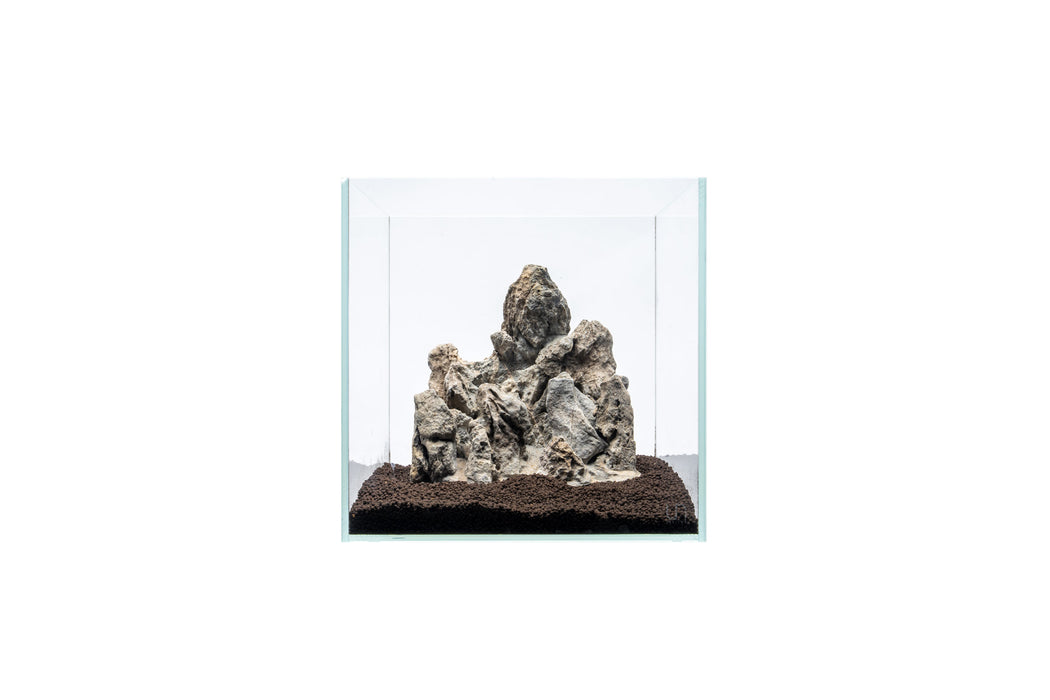 UNSHARDSCAPE Boutique Seiryu stone showpiece featuring a natural, textured stone with elegant blue-gray hues and intricate details.