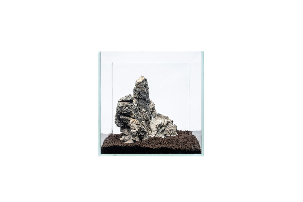 Elegant Seiryu stone showpiece by UNSHARDSCAPE, featuring natural textured stone in a decorative display.