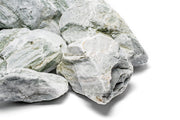 Gray Caledonia stone from UNSHARDSCAPE, showing a textured natural stone surface ideal for landscaping or decorative projects.