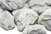 Natural Caledonia Stone from UNSHARDSCAPE, showcasing its textured, earthy appearance suitable for landscaping and decor.