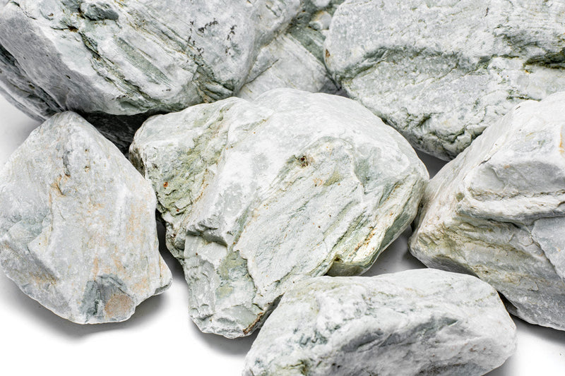 Natural Caledonia Stone from UNSHARDSCAPE, showcasing its textured, earthy appearance suitable for landscaping and decor.