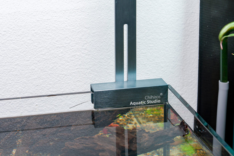 Chihiros RGB Vivid & WRGB light stand for aquarium lighting, showcasing the adjustable LED lighting setup on a sleek stand.