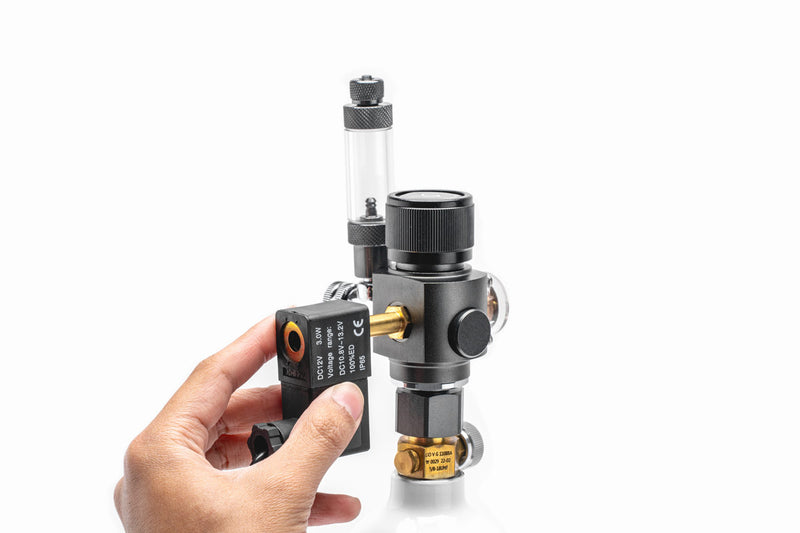 UNSCO2 CO2 regulator solenoid replacement accessory with electrical connections and mounting components.