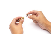 UNSCO2 CO2 solenoid spring switch replacement accessory showing the metallic switch component on a plain background.