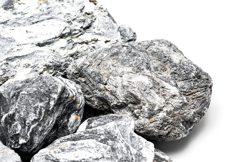 UNSHARDSCAPE Cueva Stone, natural decorative stone with textured surface, ideal for landscaping and interior design projects.
