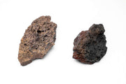 Unshardscape Fire Stone, a natural stone with fiery red and orange hues, used for decorative or craft purposes.