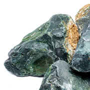 Smooth green jade stone from UNSHARDSCAPE, showcasing its polished surface and natural stone texture.