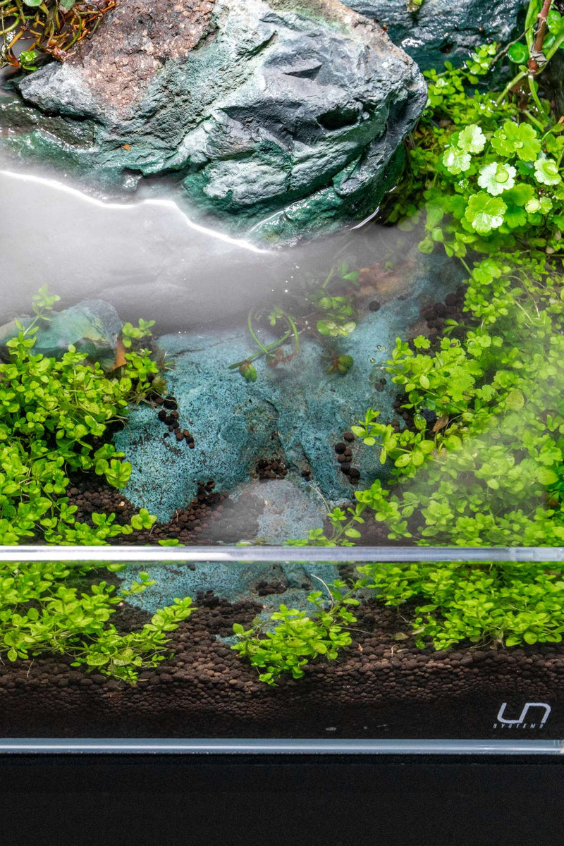 Smooth green jade stone from UNSHARDSCAPE, showcasing its polished surface and natural stone texture.