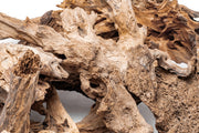 Natural driftwood piece called Madra Wood from UNSHARDSCAPE, showcasing its textured, weathered wood surface and organic shape.