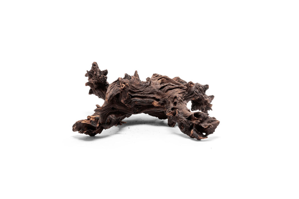 Malaysian driftwood piece from UNSHARDSCAPE showcasing natural, weathered wood with intricate textures and organic shapes.