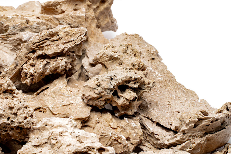 Patagonia Stone by UNSHARDSCAPE featuring a textured, natural stone with earthy tones and unique surface details.