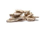 Natural premium shelf rock for hardscape, 40lb package, by Marco Rocks, showing textured, layered rock with varied earthy tones.
