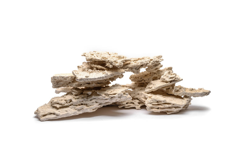 Natural premium shelf rock for hardscape, 40lb package, by Marco Rocks, showing textured, layered rock with varied earthy tones.