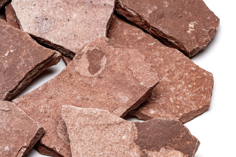 Smooth red river slate stone from UNSHARDSCAPE with natural textured surface, ideal for landscaping and decorative projects.