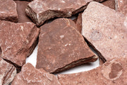 Red River Slate stone from UNSHARDSCAPE with a rich red and gray textured surface, ideal for landscaping or decorative use.
