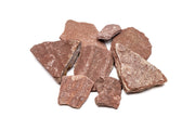 Red River Slate stone from UNSHARDSCAPE, showcasing a natural red and gray layered stone surface with textured details.