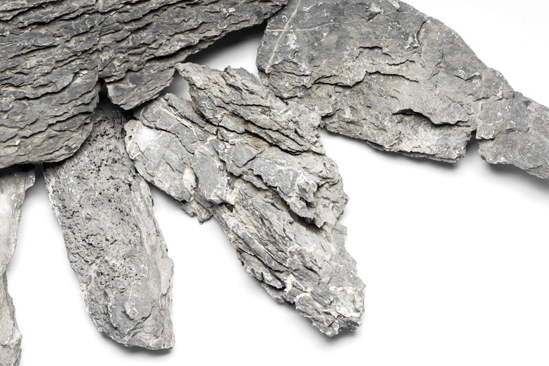 Long Seiryu stone from UNSHARDSCAPE for hardscape projects, showcasing natural gray texture and elongated shape.