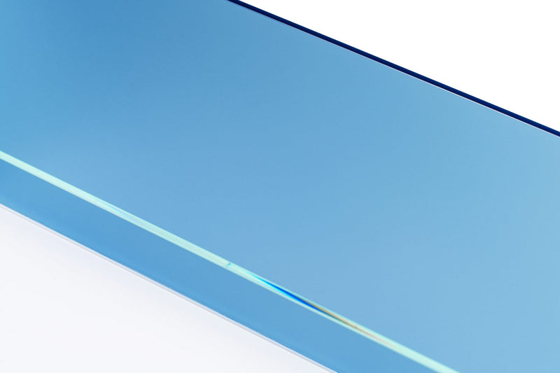 Blue rimless aquarium by Ultum Nature Systems, 4.6-gallon UNS 5N limited edition tank with clear glass and sleek design.