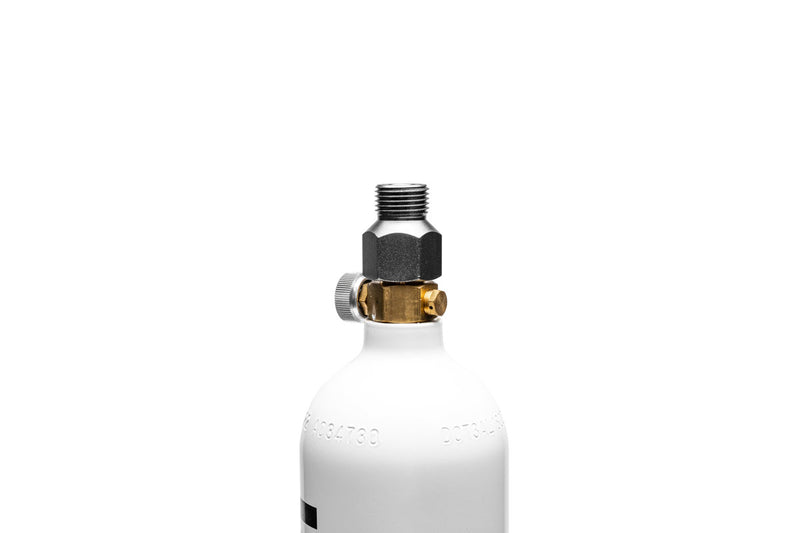 Space grey UNS CO2 paintball adapter, compact and durable for quick CO2 cartridge connection in airsoft or paintball setups.
