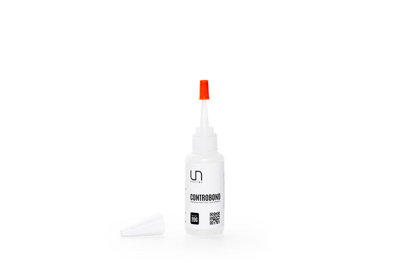 UNS Controbond hardscape adhesive by Ultum Nature Systems, shown in a tube ready for use in landscape and construction projects.