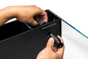 UNS3D Dual AIO Rotary Nozzle V2 accessory for 3D printers, shown in black with dual rotary heads and adjustable components.