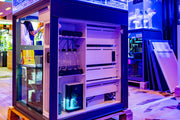 Rimless UNS Frag System R80 coral frag tank by Ultum Nature Systems with clear glass and integrated filtration system.