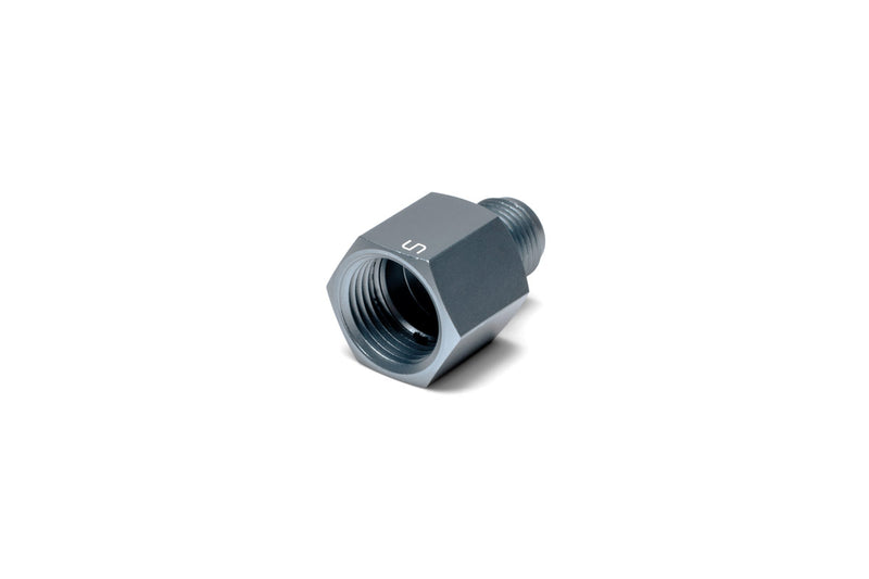 UNS Micro CO2 Paintball Adapter for CO2 tanks, compact and functional paintball accessory by UNSCO2, shown in black with fittings.