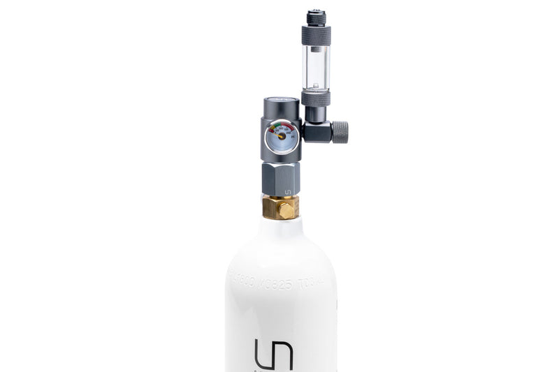 UNS Micro CO2 paintball adapter for CO2 tanks, compact and durable for easy paintball gun setup and use