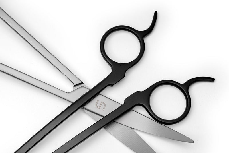 UNSTOOLS UNS Pro Aquascaping Black Wave Scissors for precise plant trimming in freshwater aquariums.