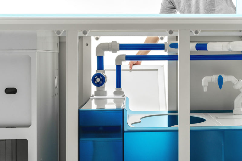 Ultem Nature Systems UNS Reef System R120 Peninsula Limited Edition rimless aquarium tank with sleek design.