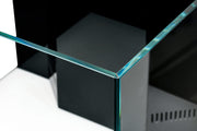 Rimless UNS Reef System R120 Shallow aquarium by Ultum Nature Systems with clear glass and minimalist design for reef keeping.