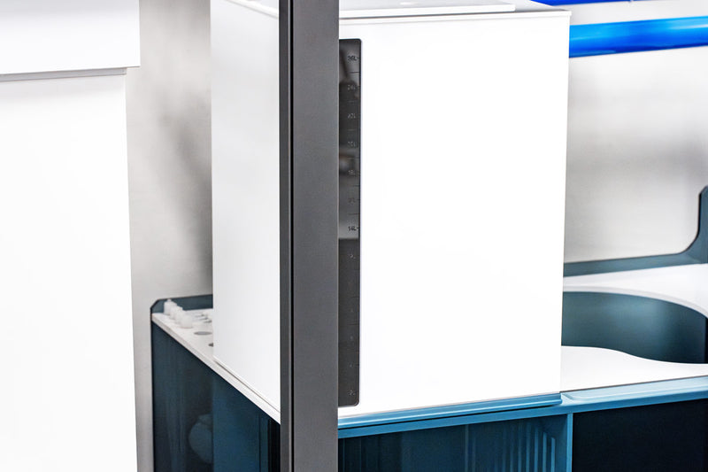 Rimless UNS Reef System R150 aquarium by Ultum Nature Systems with clear glass and sleek design for marine reef setup.